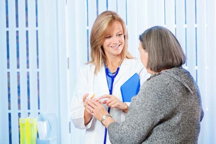 patient consulting with a woman healthcare professional